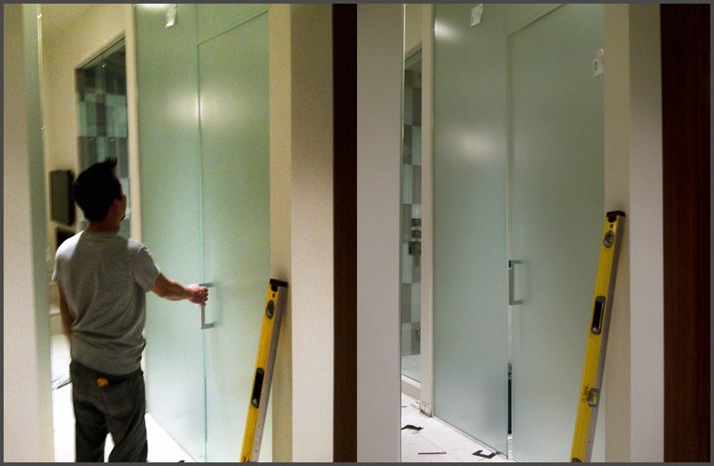 Shower doors with frosted glass installed by Angel Glass for this Vancouver west home mega shower rooms.