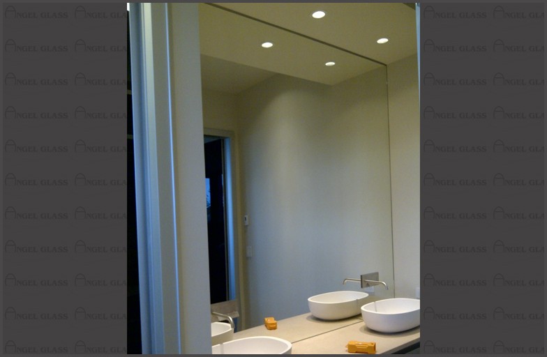 Bathroom mirrors were cut, installed into this custom West Vancouver home bathroom.