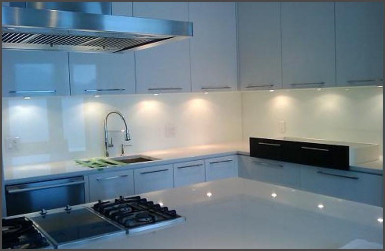 Terris lightfoot - Backsplash glass were installed by Angel Glass installers. Backsplash glass were cut, holes drilled for receptical, back painted with colors, and installed.