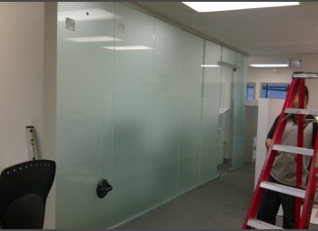 TROTTER – Frosted Glass door and frosted glass wall / glass window for this office.