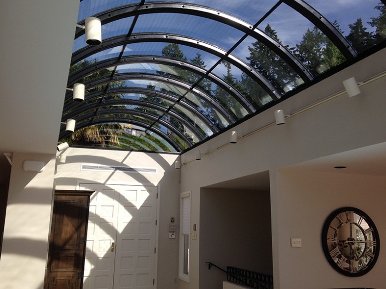 Skylight Vancouver, curved skylight system by Angel Glass company. All skylight metals were bent and curved to shapes. All skylight colored skylight glass panels were bent and curved to shapes. After installation all skylight glass and skylight metal frames fit perfectly.