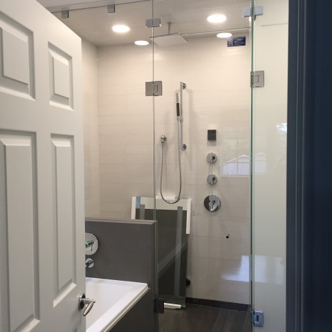 Bathroom shower door, frosted glass shower door. Installed by Angel Glass custom shower door company.