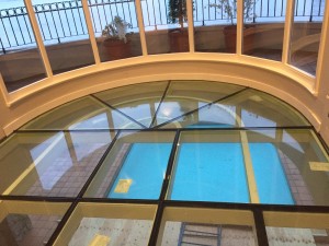 Installed walkable glass floors with shaped glass panels, curved glass panels, and all the glass were tempered laminated with a non slip coating.
