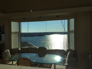 Once completed the window replacement for this apartment, the large glass panels provides optimal picture view of the Vancouver downtown English Bay beach view. 
