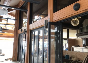 Commercial Aluminum Glass Folding Door creating three large opening at this storefront
