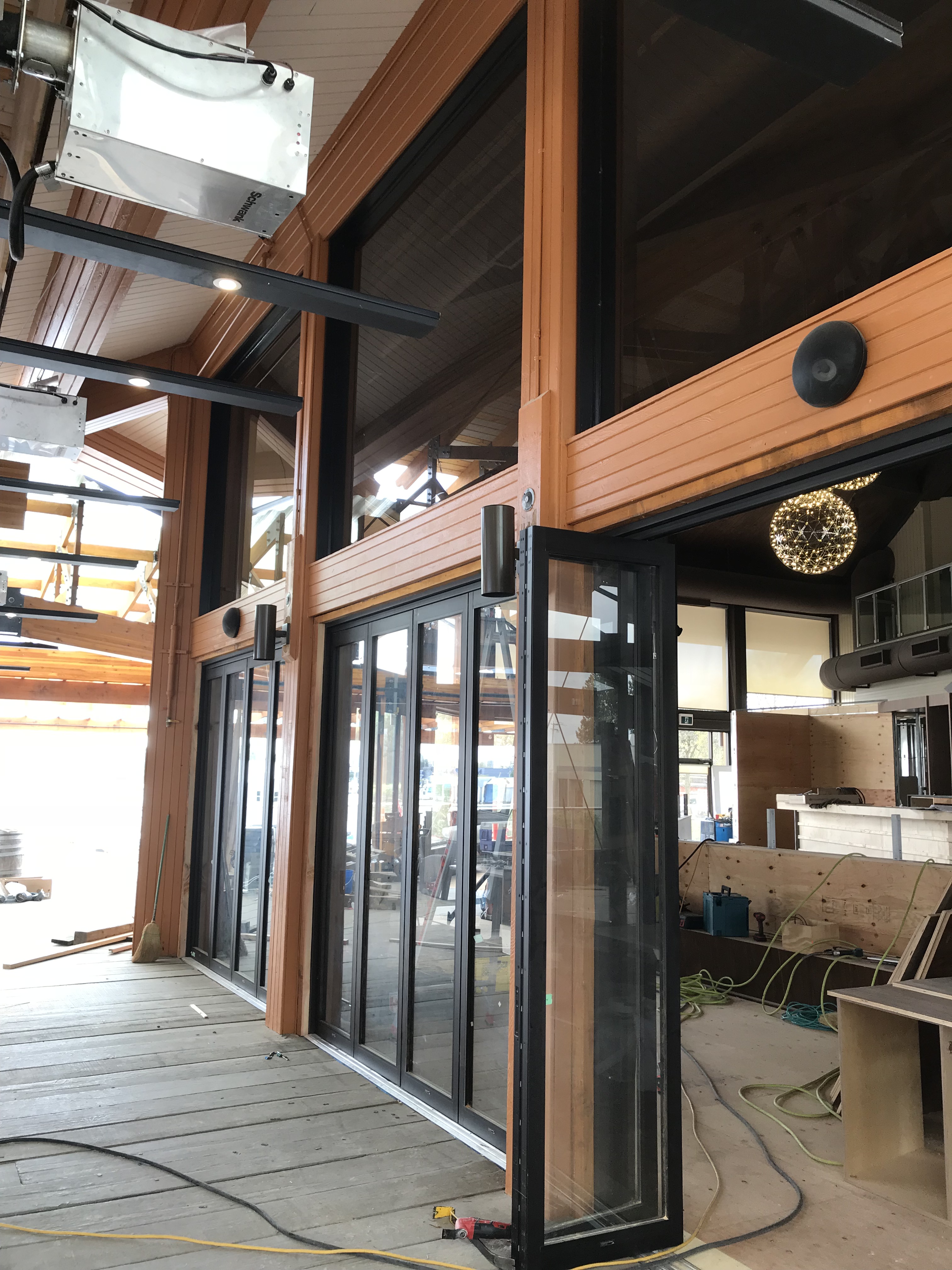 Commercial Aluminum Glass Folding Door creating three large opening at this storefront