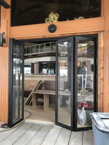 Angel Glass completed these commercial folding door for this Richmond Restaurant patio that would like full access into their restaurant from patio. We completed this folding door design to fit into the opening, then have folding door frames fabricated and installed with safety clear tempered glass.