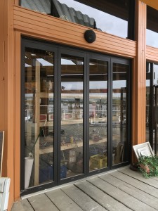 Angel Glass completed these commercial folding glass door for this Richmond Restaurant patio that would like full access into their restaurant from patio. We completed this folding door design to fit into the opening, then have folding door frames fabricated and installed with safety clear tempered glass.